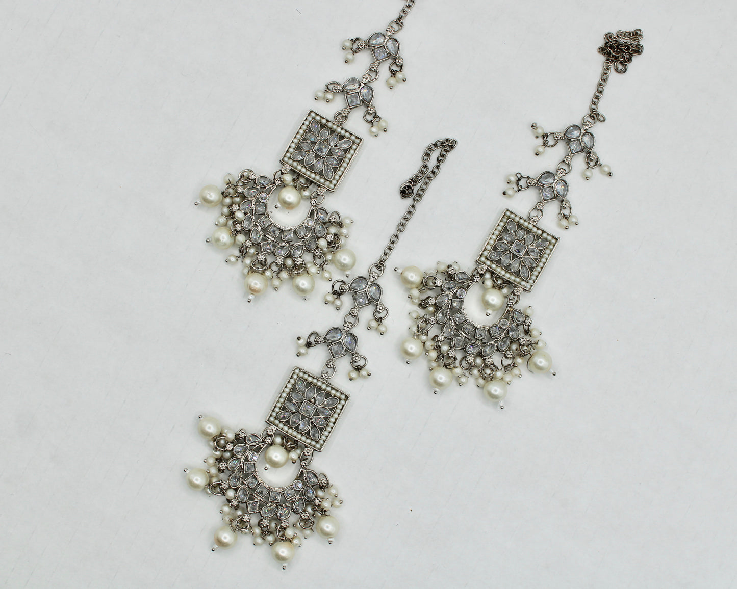 Kundan and Cubic Zirconia Teeka Set - E1321